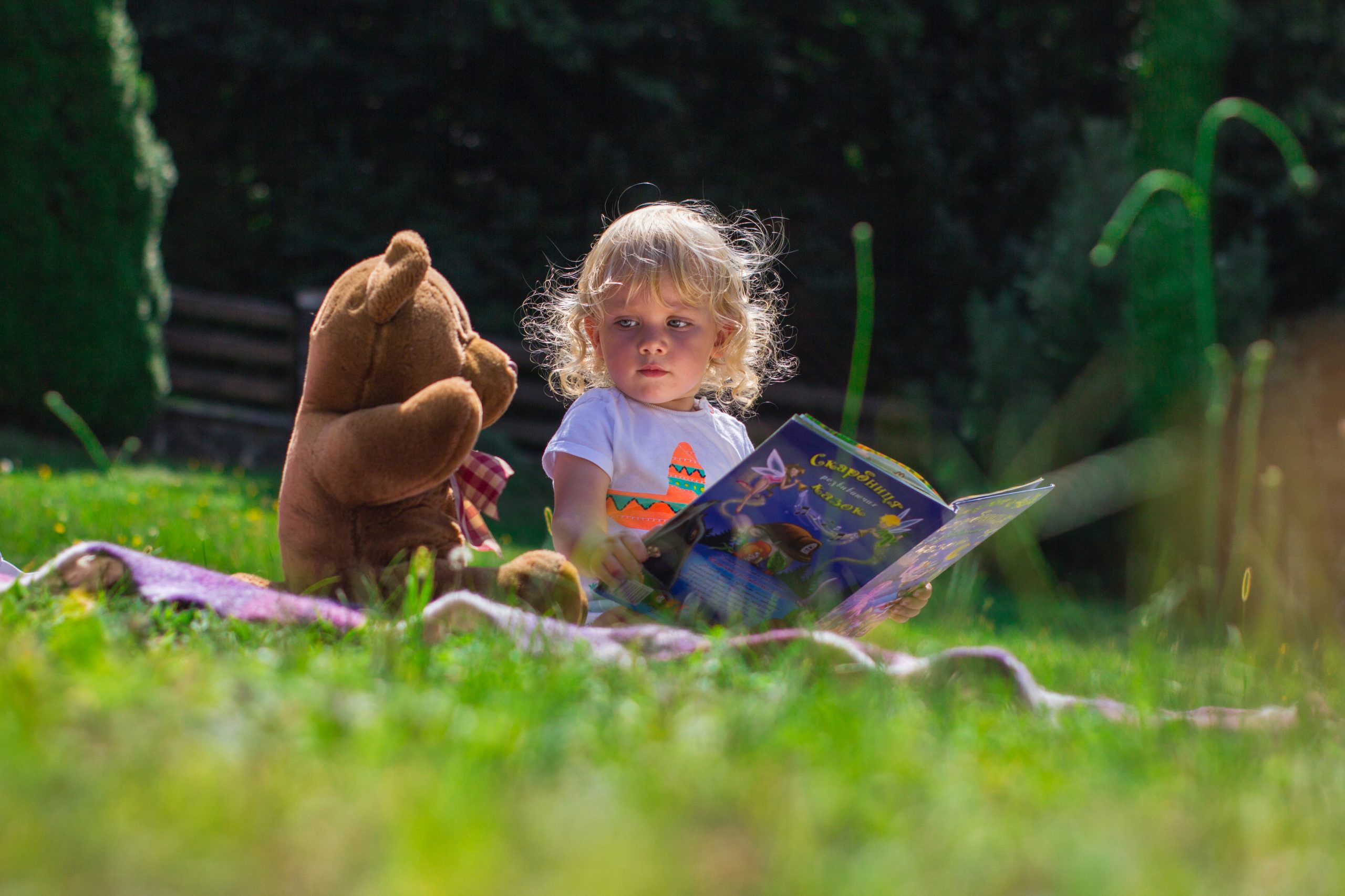 girl-sitting-beside-a-teddy-bear-2803979 copy